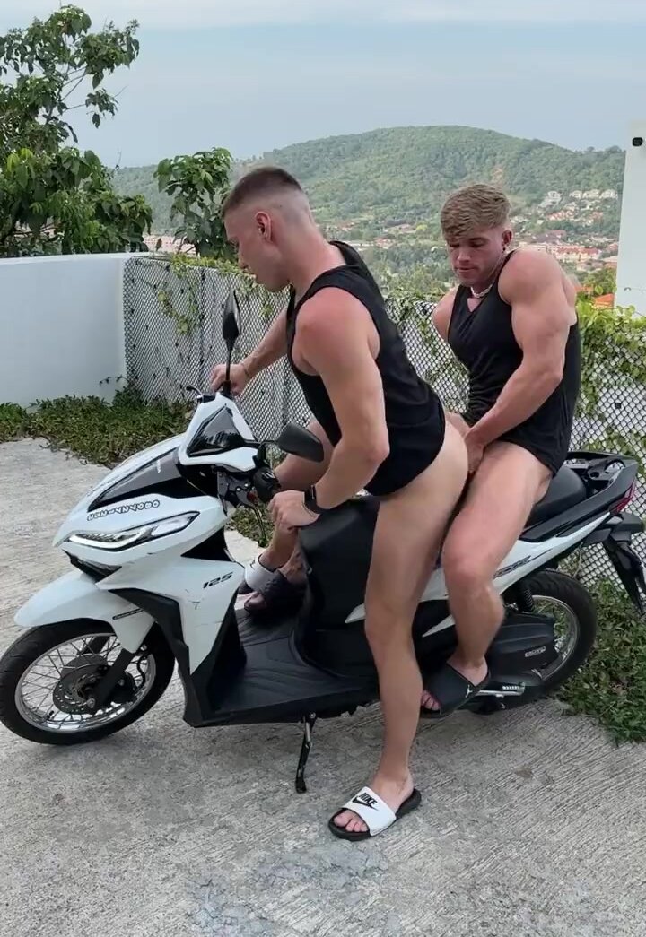 two sexy gay friend on motocyle