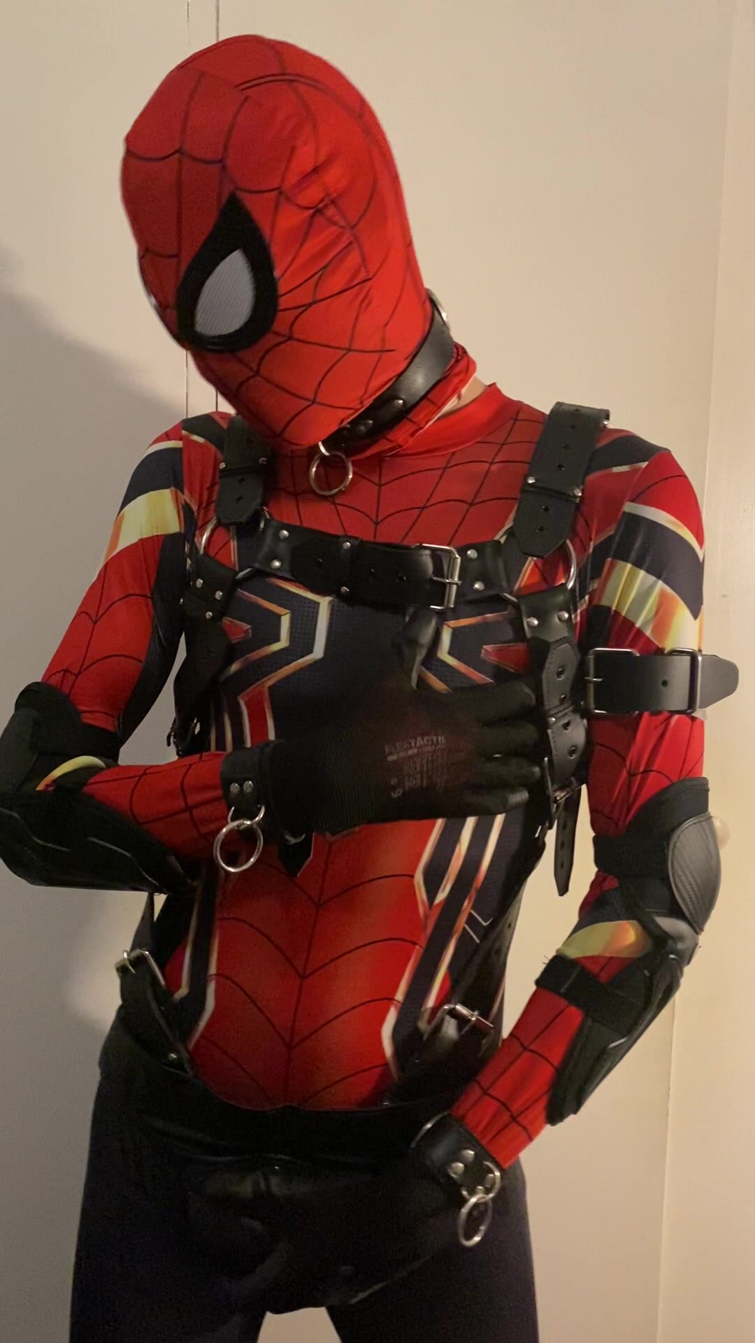 leather spiderman enjoying some techno