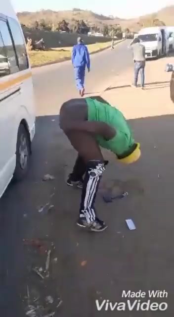 Drunk African guy spreads ass in public