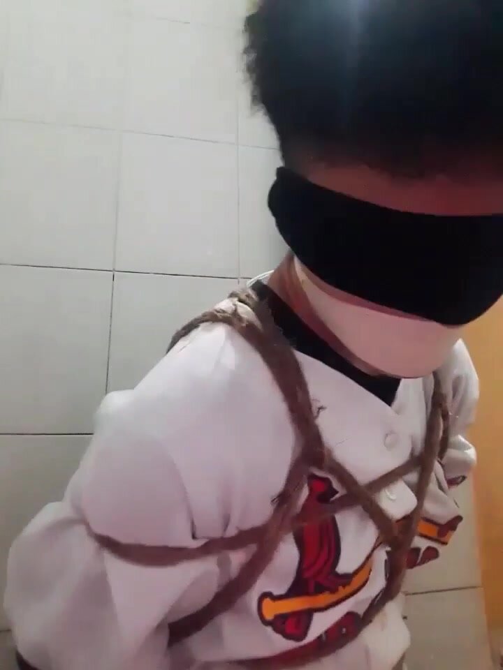 Vietnamese boy tied and gagged