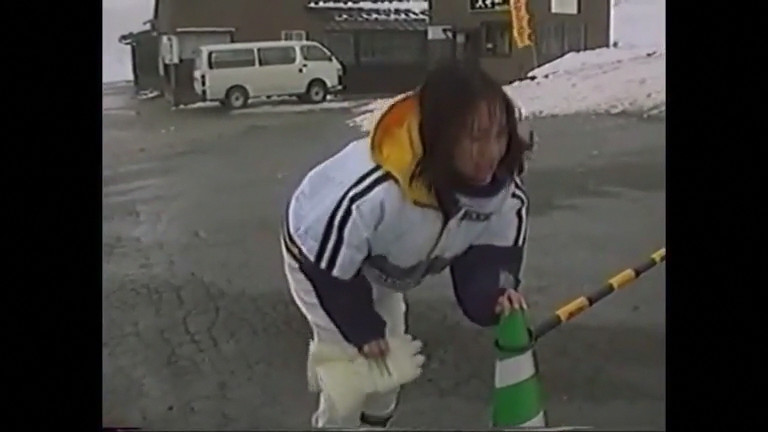 Japanese girl pees in snow pants outside
