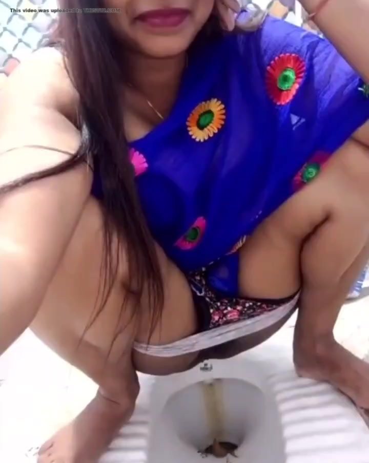 Indian lady Shitting 7