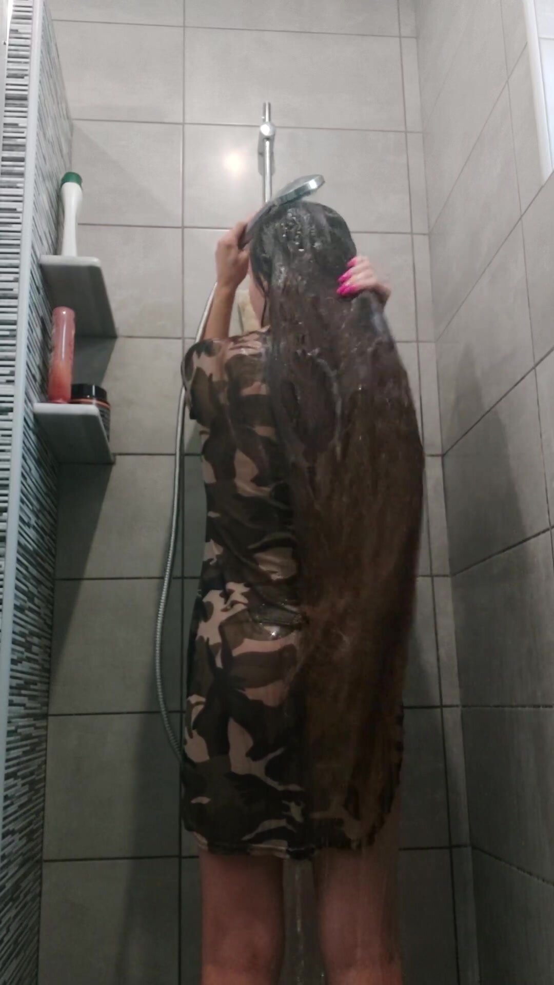 Wet long hair and clothes in the shower