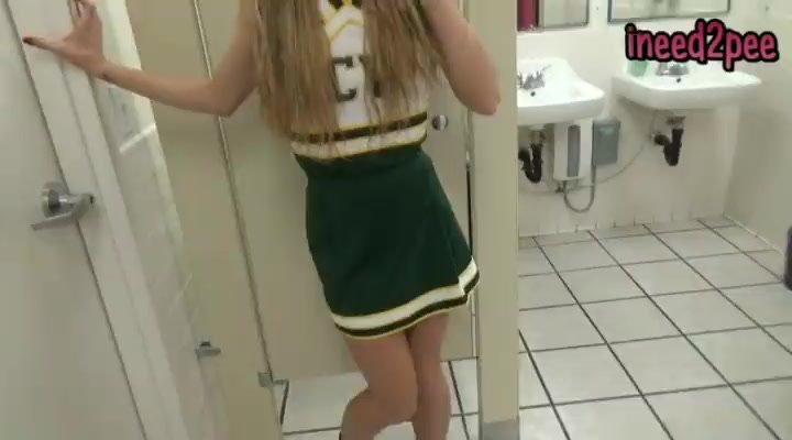 Girl pees her skirt - video 2