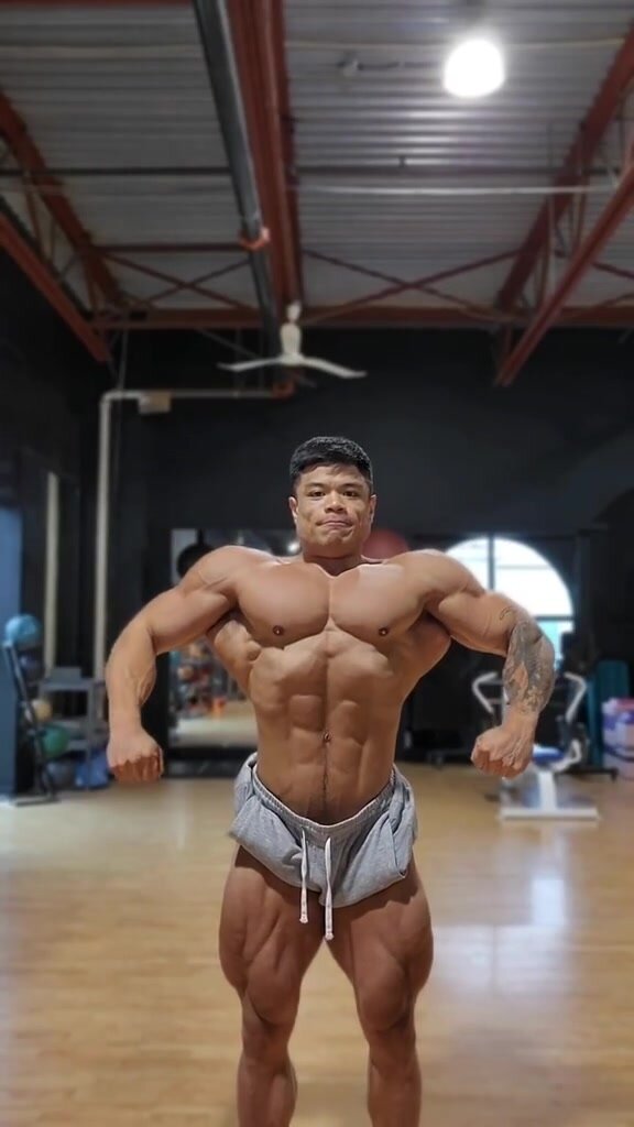 Asian muscle flexing
