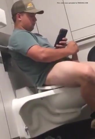 Dad wanks in public toilet