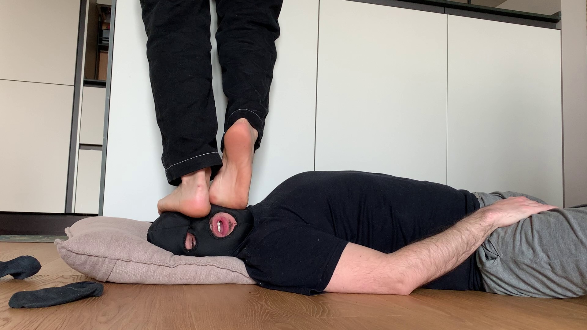 Walking on my slave's face
