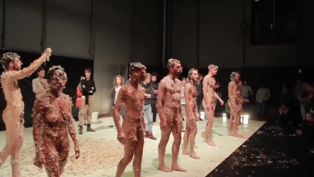 naked men in art show on stage