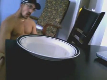 Muscular hottie shitting and eating