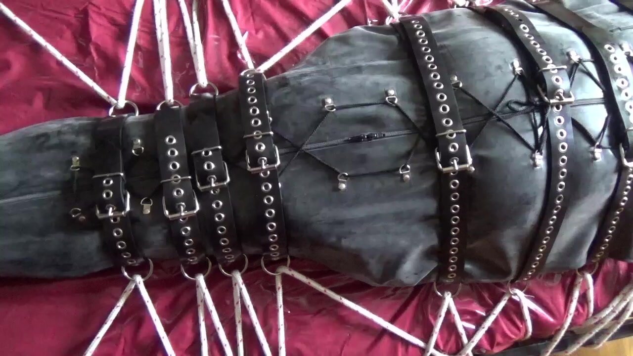 Slave in a rubber bodybag