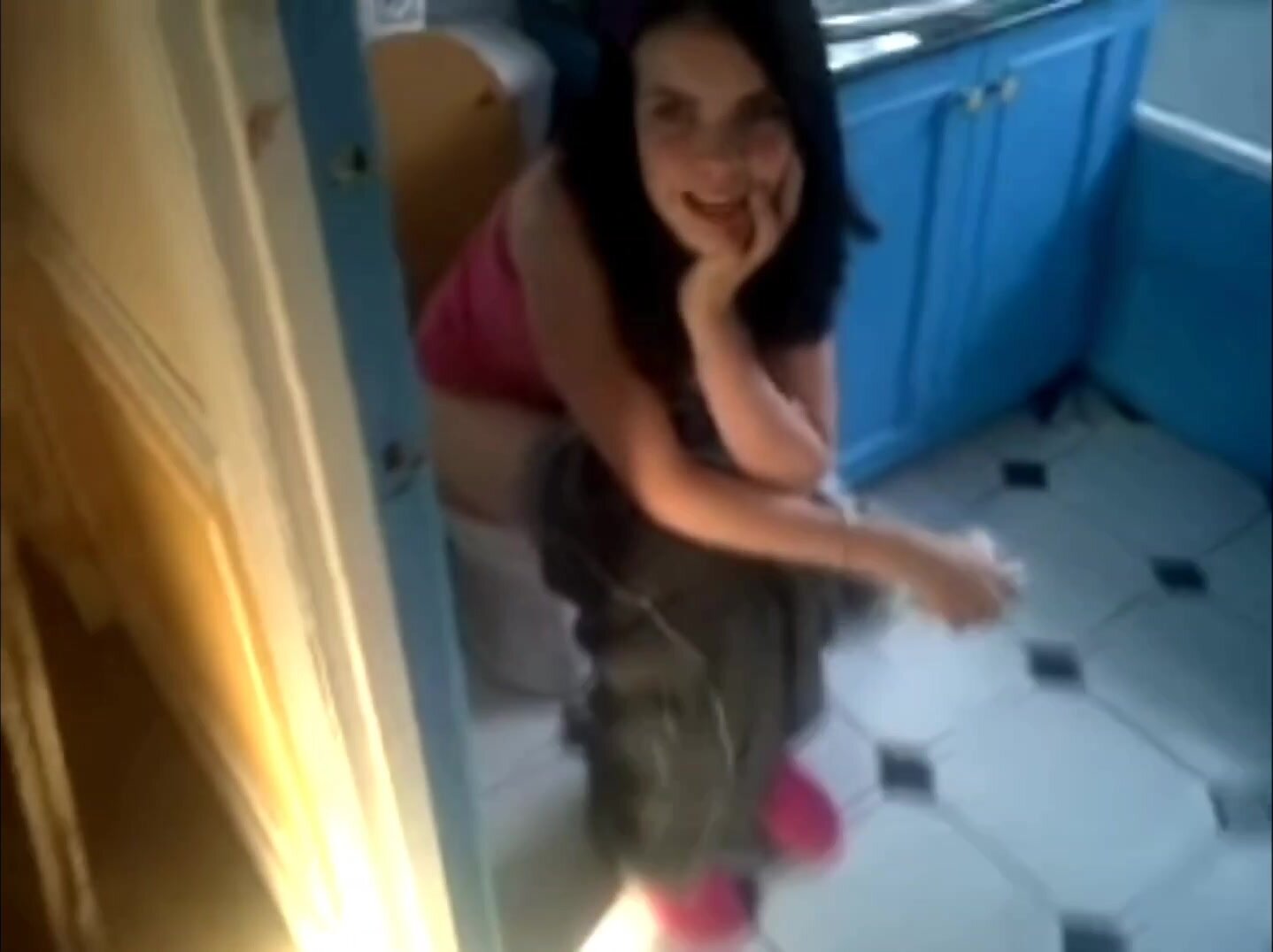Teen on the toiletbowl
