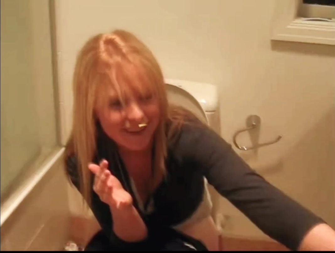 Teen pissing on the toilet - video 2