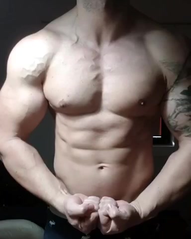 Hot Guy Flexes Muscles