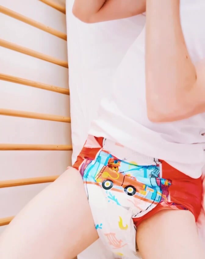 abdl boy playing in diaper