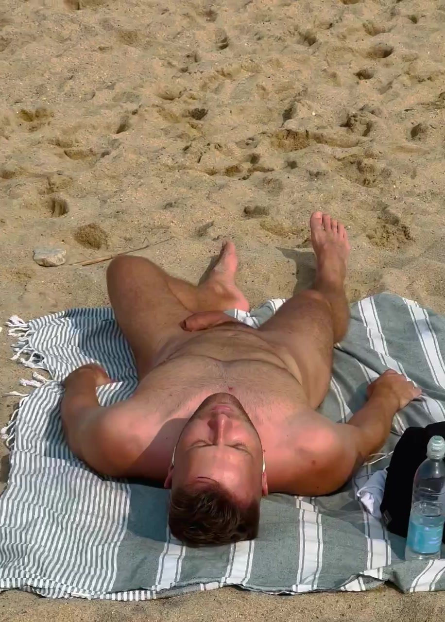 Handsome naked at beach
