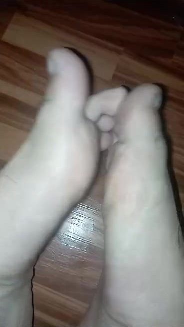 Hairy toes and feet tops close up