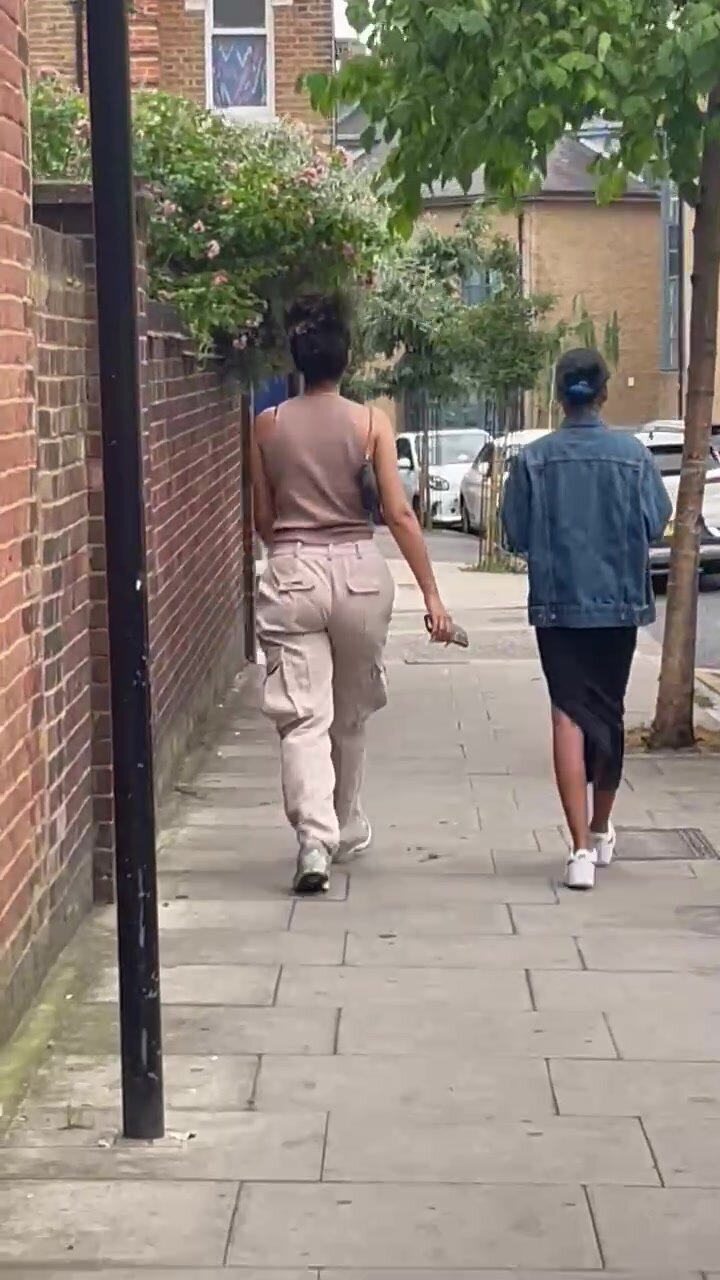 Mum and daughter public walk