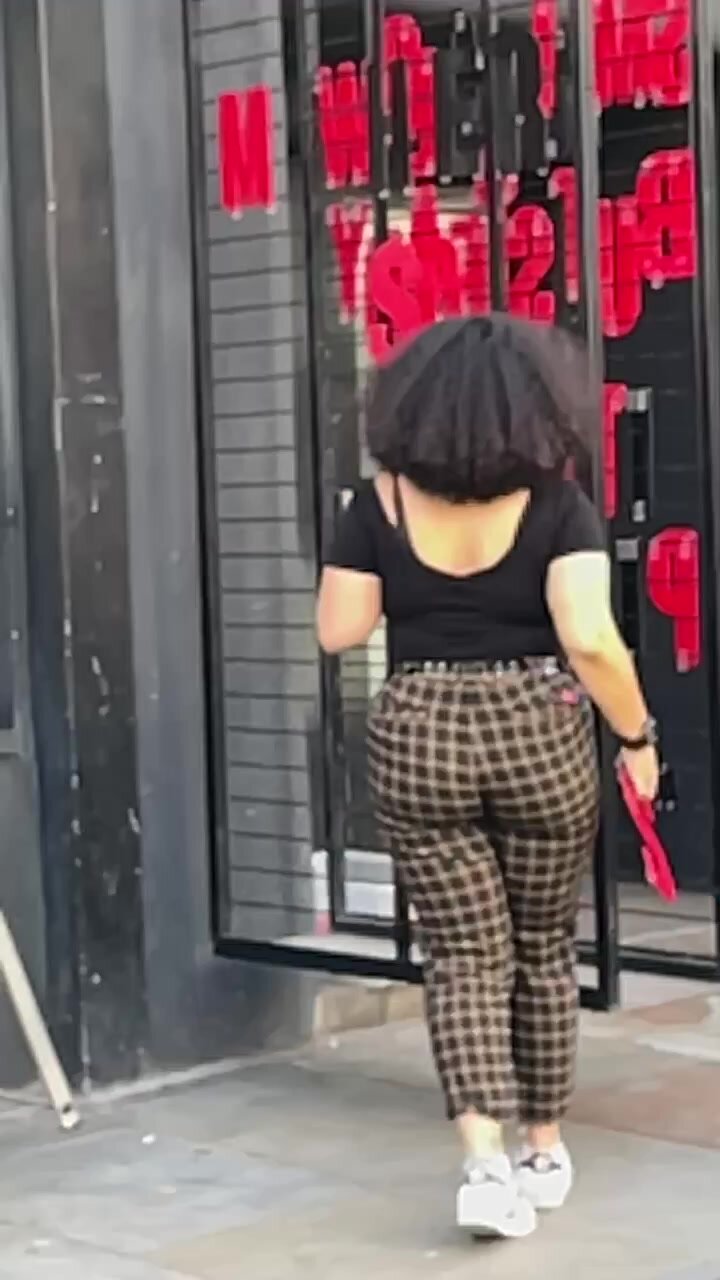 Sexy ebony milf in tight pants
