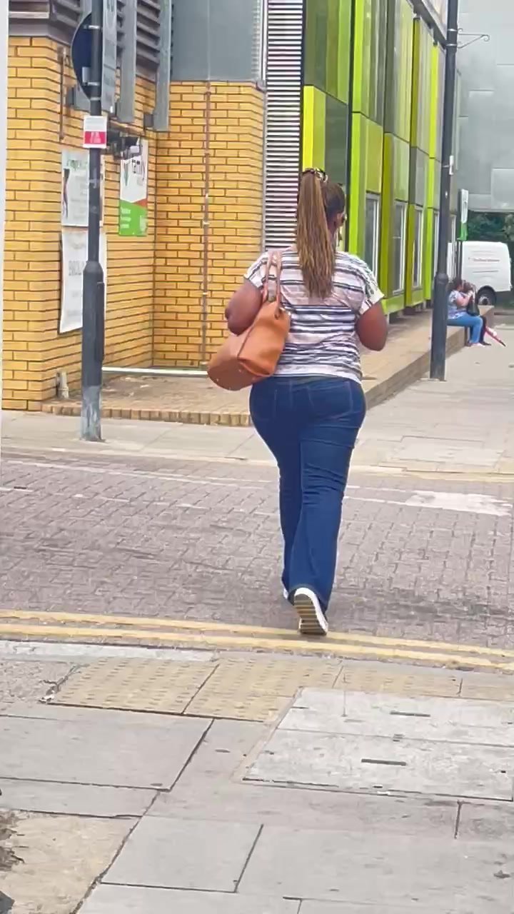 Thick ebony ass walking in jeans
