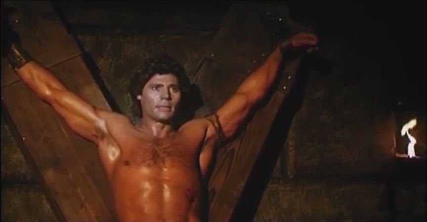 Shirtless bondage: Throne of Fire (1983)