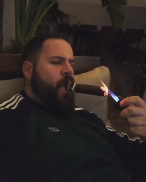 upl54 - bearded stud smokes cigar