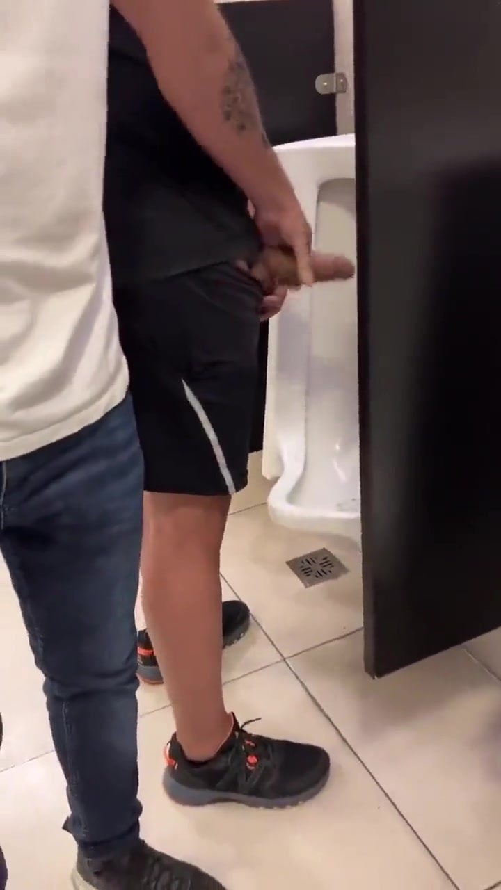 Grabbing A Thick Cock In Public Toilet's Urinal