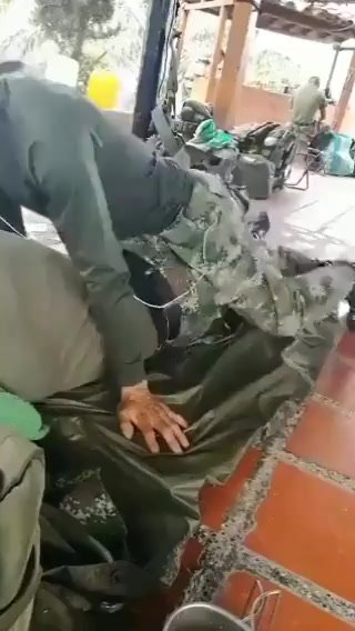 2 straight military guys rubbing each other
