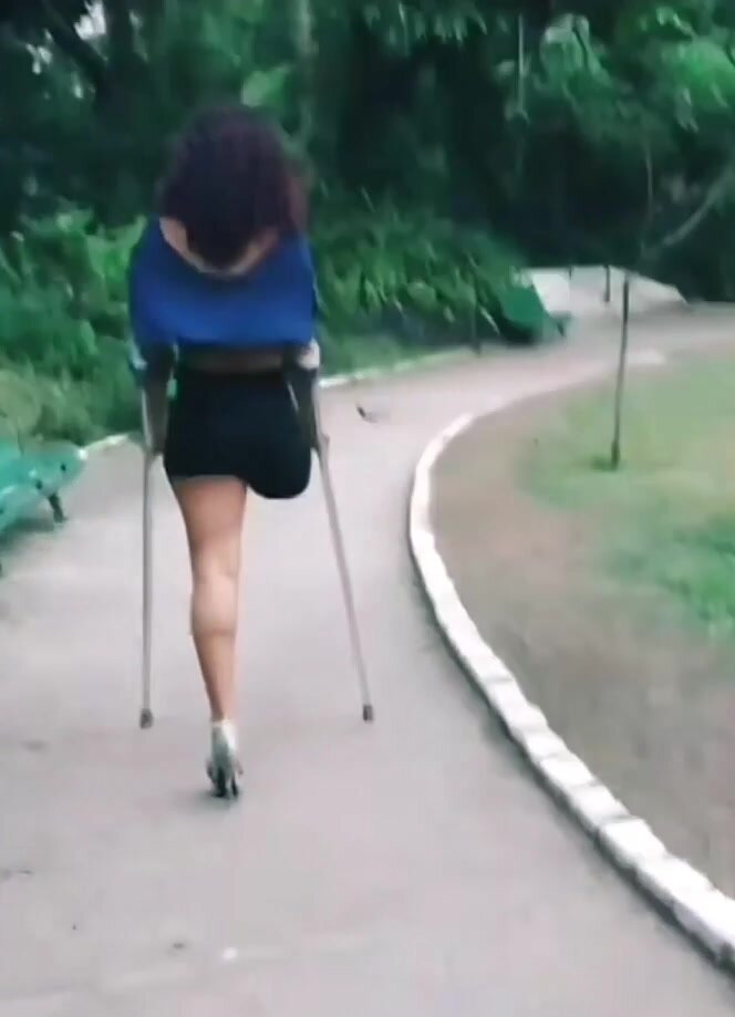crutching SAK in high heel
