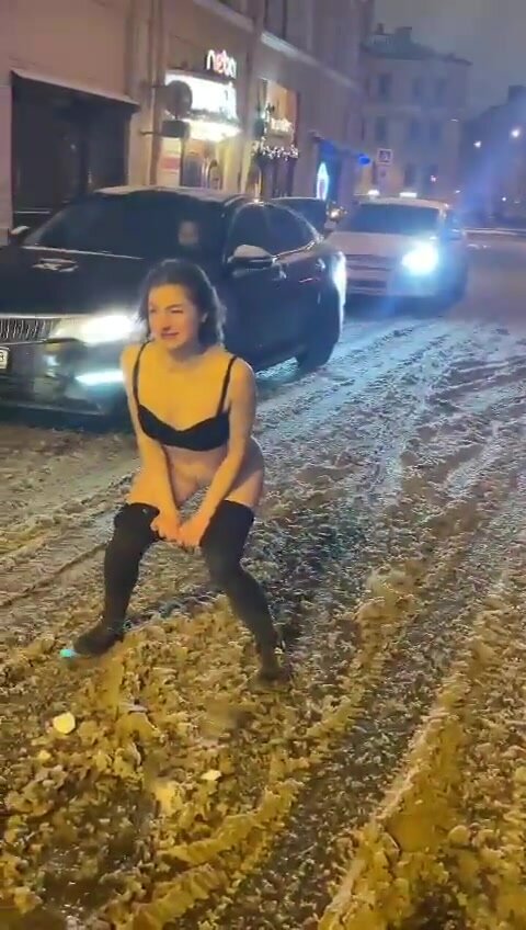 Drunk German pops a high squat in mi... of snowy road