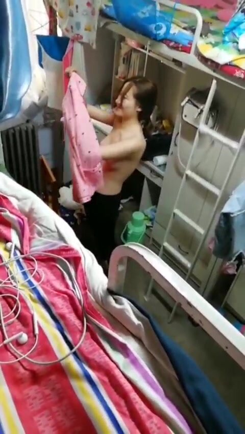 Chinese woman changing top