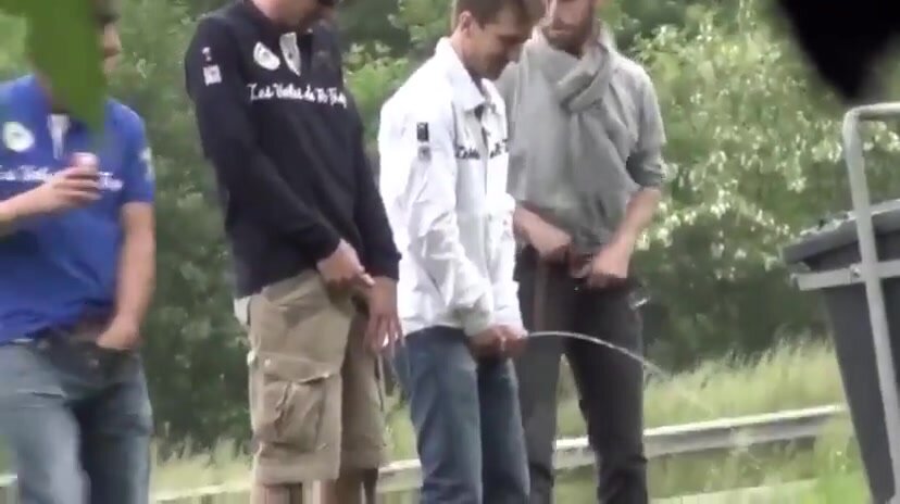 Guys pissing together - video 2