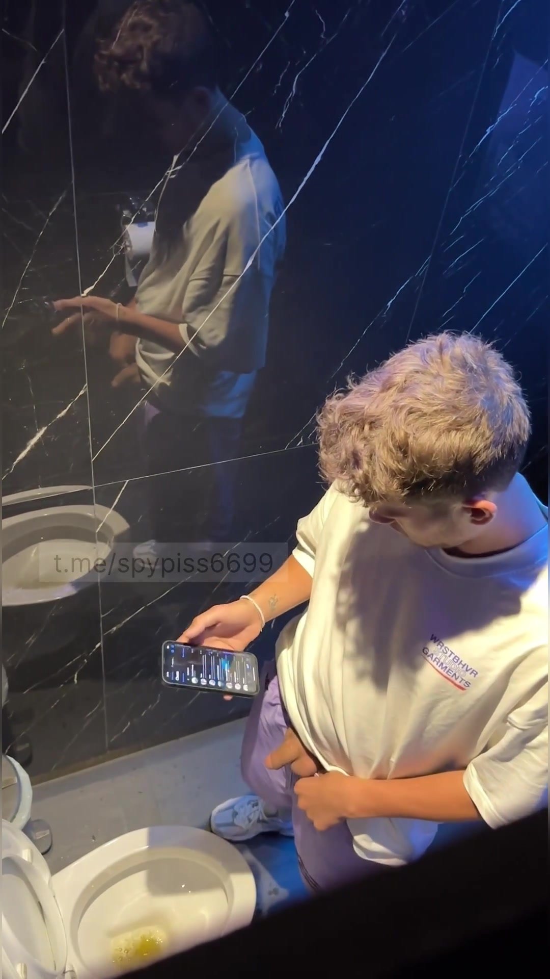 two guys pissing in toilet with dick and balls out