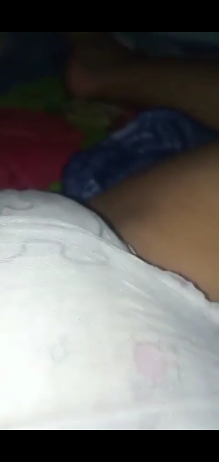 Asian teen girl wetting diaper