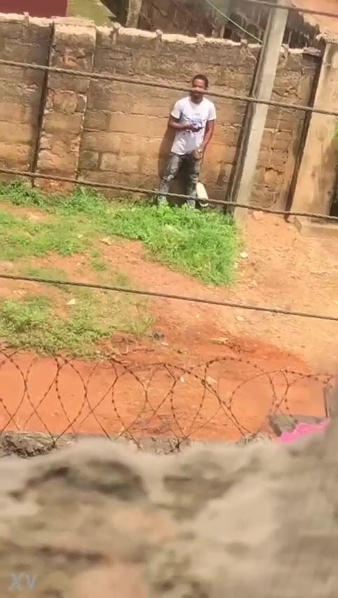African guy caught wanking in the street - video 2