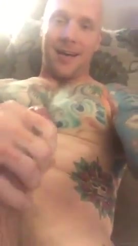 bald headed tattooed hunk cumming