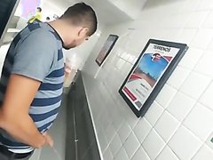 Young men pissing