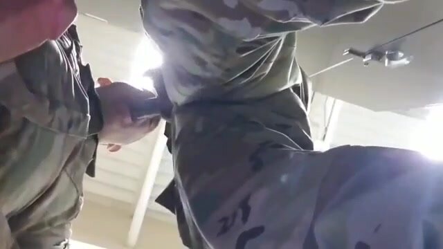 Soldier sucks soldier