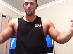 Beautiful muscle bodybuilder strips in bedroom