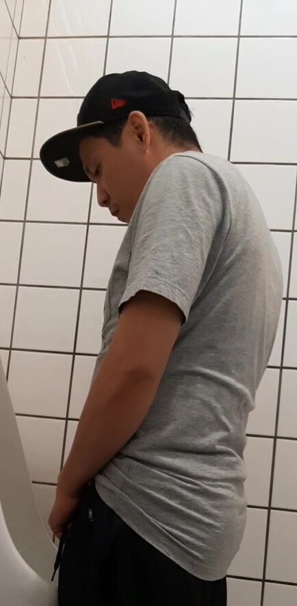 A long piss at urinal