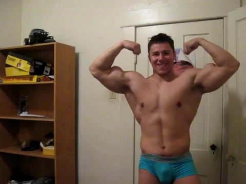 Muscle posing and flexing at home