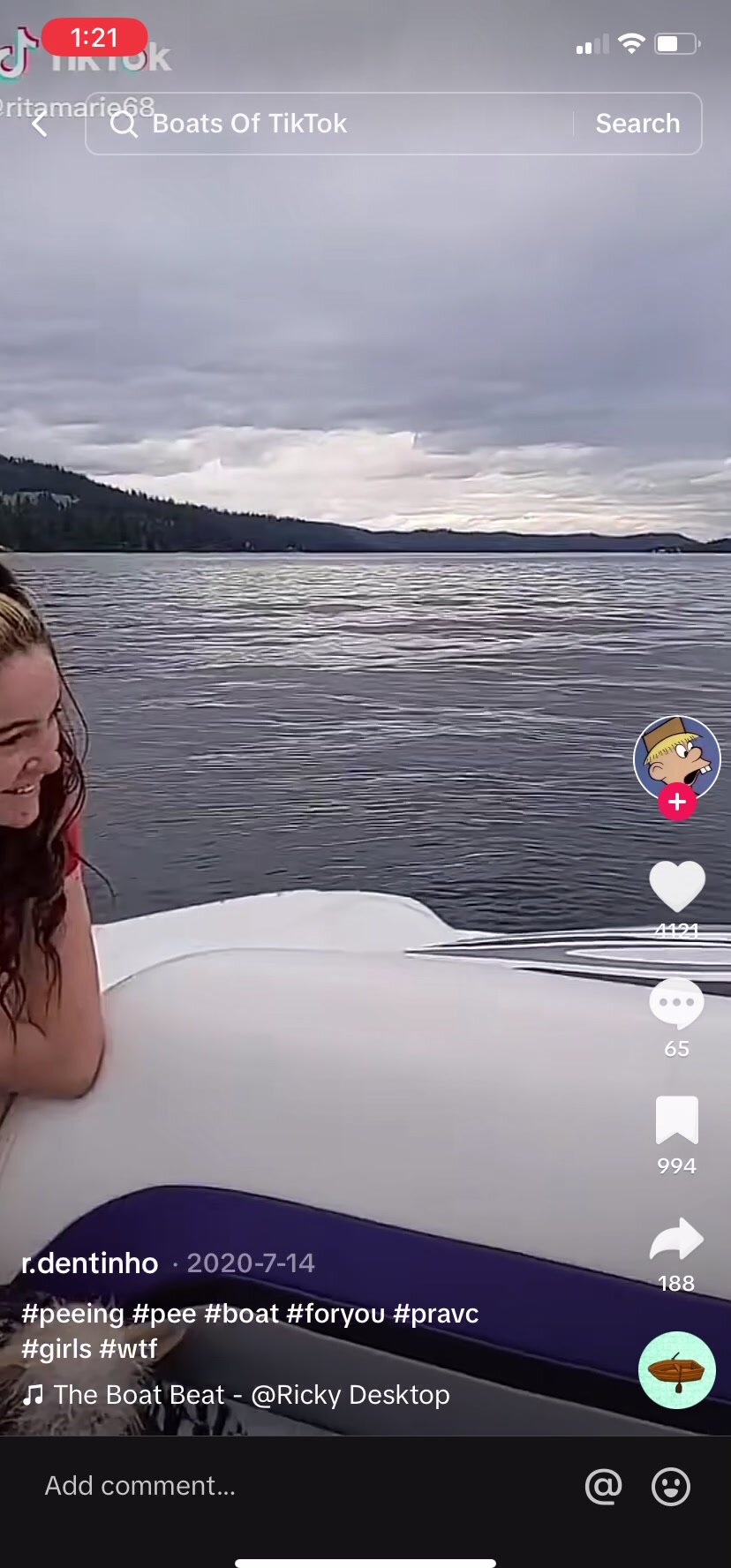 two cute girls pee off boat