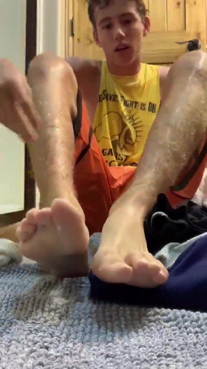 lboy drying his feet