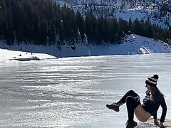 Cute quick burst of pee in nature on the frozen river