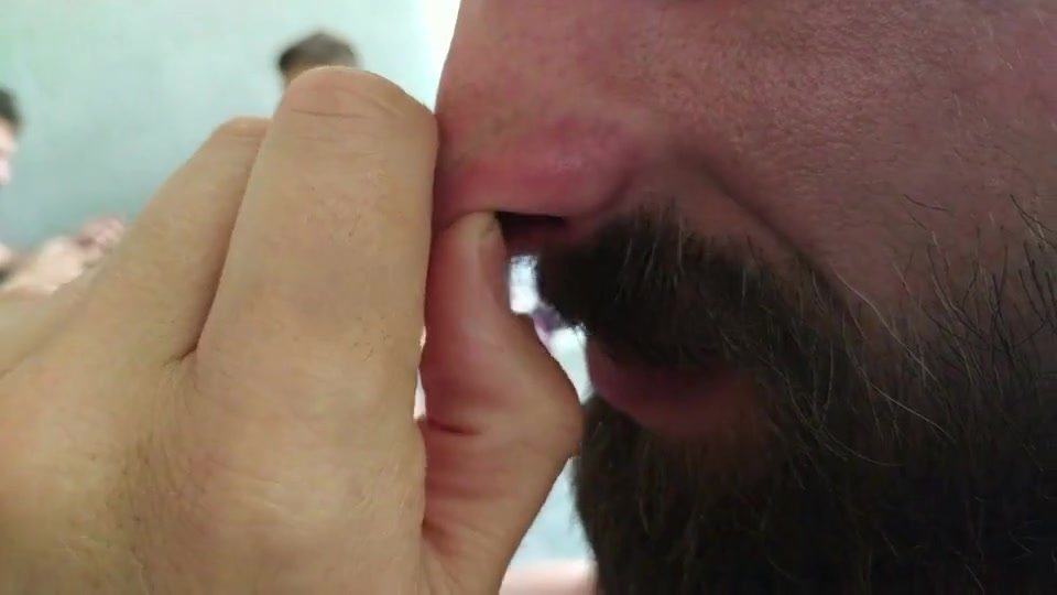 Guy Rubbing His Big Nose