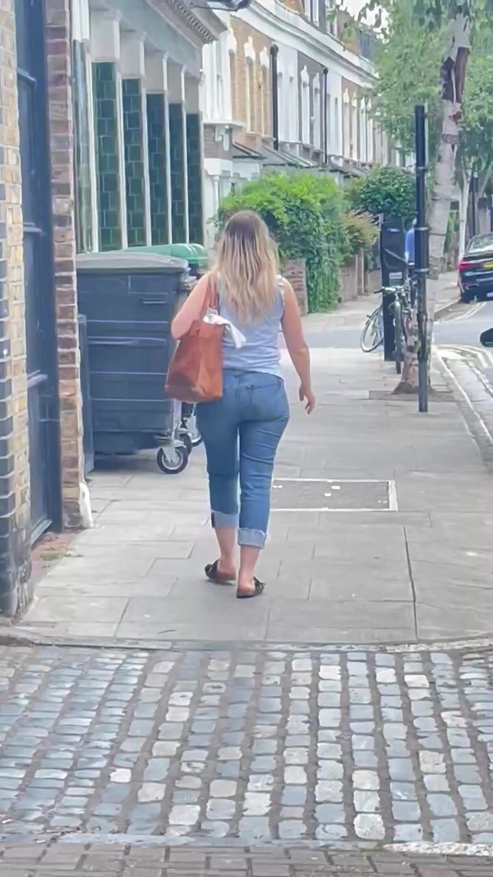 Fit blonde walking in public