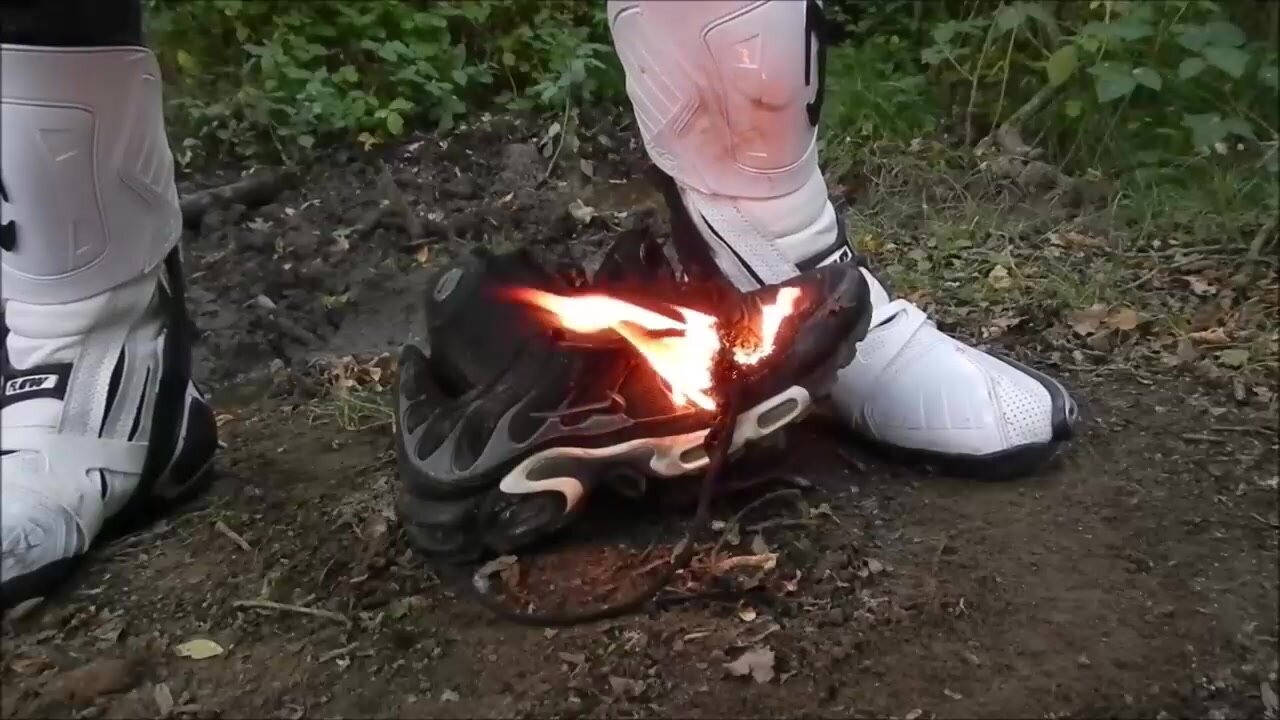 Various old motocross boots burned, TNs stomped/ripped