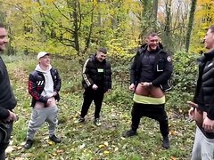 Wanking group in a forest