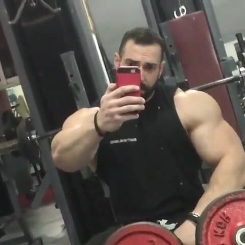Muscle Monster flex his massive arms
