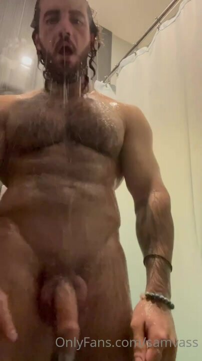 Hairy greek god taking a shower