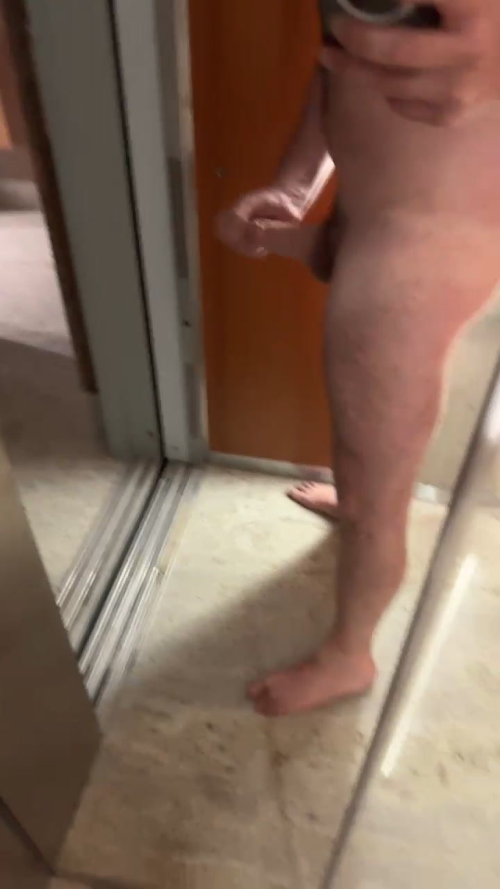 exhibitionist naked in the elevator